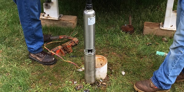 a well pump above ground - water well maintenance